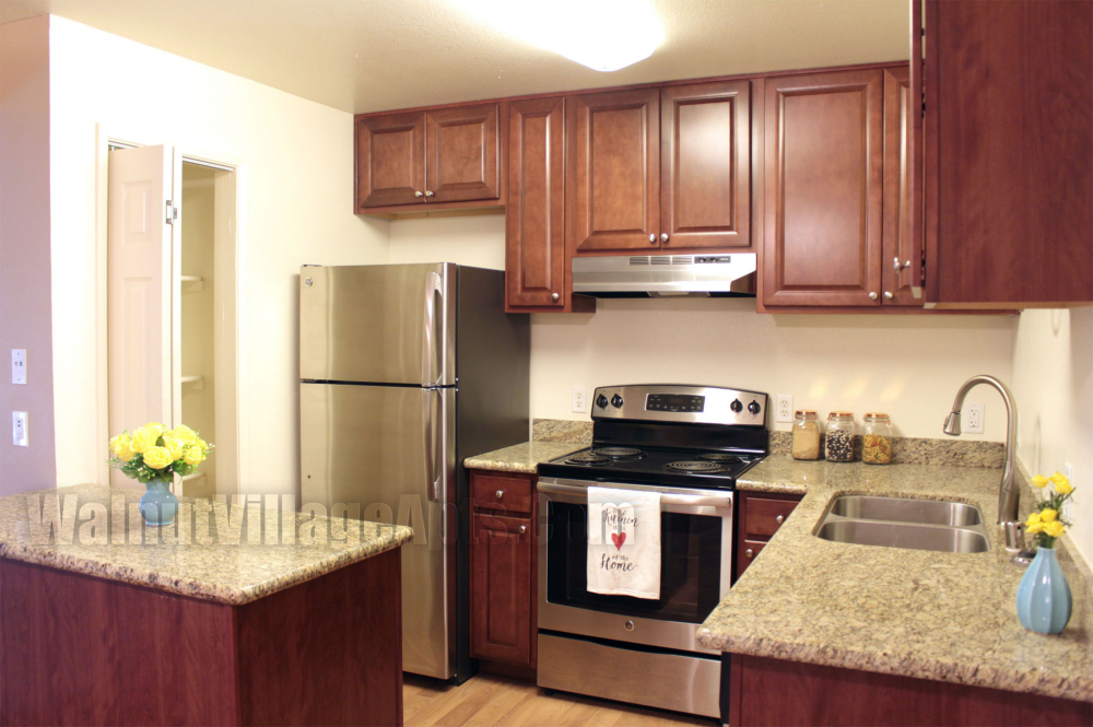 Thank you for viewing our Living, kitchen, dining 5 at Walnut Village Apartments in the city of Sacramento.